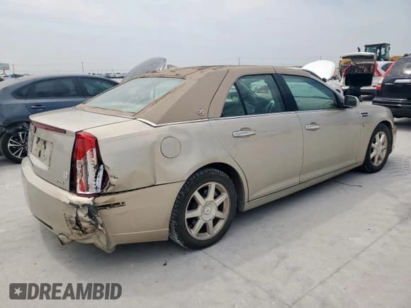 ✅ 2009 Cadillac STS RWD • VIN: 1G6DW67V790132371 • Лот: 70007485. Опубликован ранее на Copart с пробегом 81 181 миль. Бесплатный доступ к архиву аукционных продаж из США и подробный отчёт об истории автомобиля на DreamBid. Изображение 3.