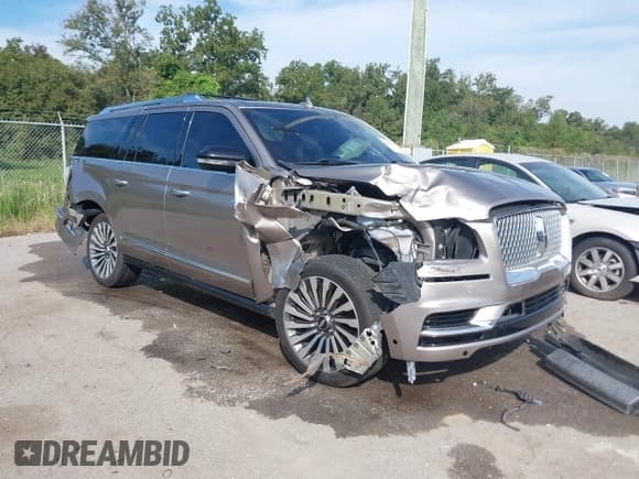 ✅ 2019 Lincoln Navigator Reserve • VIN: 5LMJJ3LT4KEL22261 • Лот: 43293071. Опубликован ранее на IAAI с пробегом 99 006 миль. Бесплатный доступ к архиву аукционных продаж из США и подробный отчёт об истории автомобиля на DreamBid. Изображение 1.