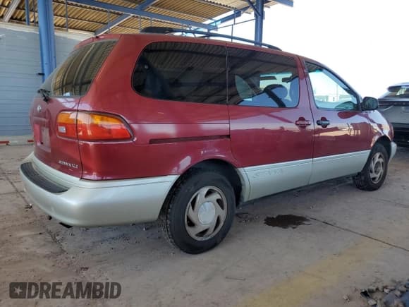 ✅ 1999 Toyota Sienna LE • VIN: 4T3ZF13C2XU123810 • Lot: 73245874. Listed on Copart with 219,762 mi. Free auction sales archive from the USA and detailed vehicle history report at DreamBid. Image 3.