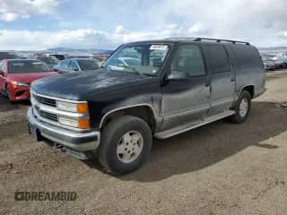 1995 Chevrolet Suburban z VIN 1GNFK16K1SJ417005, wystawiony jako Copart lot #48648975 z przebiegiem 179 173 mil mil oraz Czysty tytuł • Clean title. Historia ofert i sprzedaży dostępna na DreamBid. Obrazek 1.