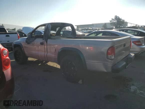 2000 Dodge Dakota z VIN 1B7FL26P7YS746821, wystawiony jako Copart lot #89311545 z przebiegiem Nie podano mil oraz Nie do naprawy • Non repairable. Historia ofert i sprzedaży dostępna na DreamBid. Obrazek 2.