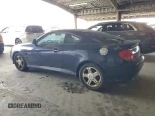 ✅ 2004 Hyundai Tiburon GS • VIN: KMHHM65D04U107131 • Лот: 72101305. Опубликован ранее на Copart с пробегом 136 073 миль. Бесплатный доступ к архиву аукционных продаж из США и подробный отчёт об истории автомобиля на DreamBid. Изображение 2.