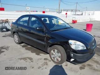 ✅ 2009 Kia Rio LX • VIN: KNADE223396522909 • Lot: 43475782. Wystawiony na IAAI z przebiegiem 31 637 mil. Bezpłatny archiwum sprzedaży aukcyjnych z USA i szczegółowy raport historii pojazdu na DreamBid. Zdjęcie 1.