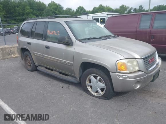 ✅ 2002 GMC Envoy SLT • VIN: 1GKDT13S022283765 • Lot: 42668763. Wystawiony na IAAI z przebiegiem 198 711 mil. Bezpłatny archiwum sprzedaży aukcyjnych z USA i szczegółowy raport historii pojazdu na DreamBid. Zdjęcie 1.