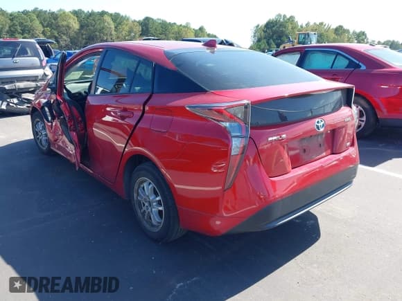✅ 2018 Toyota Prius Three Touring • VIN: JTDKARFU8J3061469 • Лот: 43361072. Опубликован ранее на IAAI с пробегом 94 066 миль. Бесплатный доступ к архиву аукционных продаж из США и подробный отчёт об истории автомобиля на DreamBid. Изображение 3.