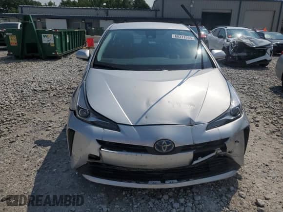 2022 Toyota Prius L Eco с VIN JTDKAMFU3N3184279, выставлен на аукционе Copart как лот 68371565 с пробегом 179 376 миль миль и На запчасти • Non repairable. История ставок и продаж доступна на DreamBid. Изображение 5.