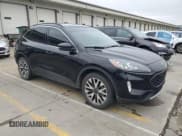 ✅ 2020 Ford Escape Titanium • VIN: 1FMCU9J9XLUA29209 • Lot: 54379545. Listed on Copart with 75,412 mi. Free auction sales archive from the USA and detailed vehicle history report at DreamBid. Image 4.