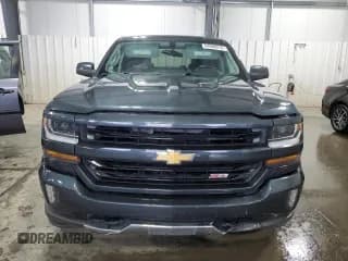 ✅ 2017 Chevrolet Silverado 1500 LT • VIN: 3GCUKREC4HG152339 • Лот: 68686014. Опубликован ранее на Copart с пробегом 119 762 миль. Бесплатный доступ к архиву аукционных продаж из США и подробный отчёт об истории автомобиля на DreamBid. Изображение 5.