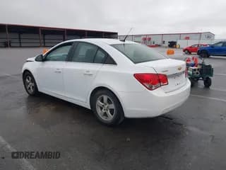 ✅ 2014 Chevrolet Cruze 1LT • VIN: 1G1PC5SB3E7432235 • Lot: 43293148. Listed on IAAI with 125,489 mi. Free auction sales archive from the USA and detailed vehicle history report at DreamBid. Image 3.