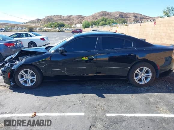 2021 Dodge Charger SXT with VIN 2C3CDXBG4MH536671, listed as a IAAI auction lot 43460985 with 83,143 mi miles and . Bid and sale history available at DreamBid. Image 14.