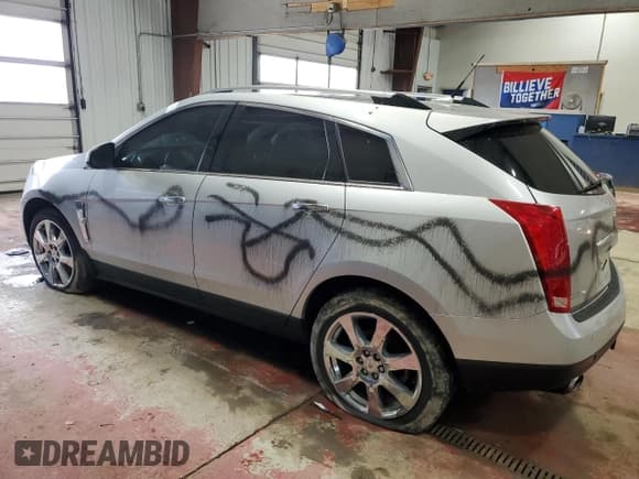 ✅ 2010 Cadillac SRX Performance Collection • VIN: 3GYFNEEY1AS602238 • Lot: 52157725. Listed on Copart with 199,433 mi. Free auction sales archive from the USA and detailed vehicle history report at DreamBid. Image 2.