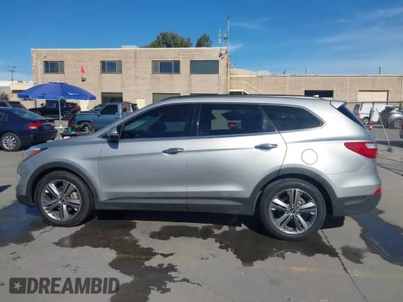 2015 Hyundai Santa Fe Limited z VIN KM8SR4HF6FU099631, wystawiony jako IAAI lot #43541205 z przebiegiem 209 264 mil mil oraz . Historia ofert i sprzedaży dostępna na DreamBid. Obrazek 15.