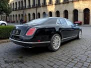 ✅ 2014 Bentley Mulsanne • VIN: SCBBB7ZH4EC019XXX • Лот: 70231545. Опубликован ранее на Copart с пробегом 11 401 миль. Бесплатный доступ к архиву аукционных продаж из США и подробный отчёт об истории автомобиля на DreamBid. Изображение 4.