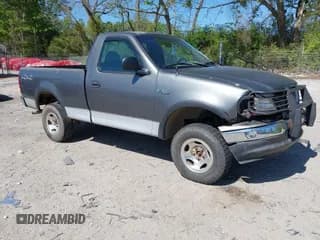 ✅ 2003 Ford F-150 XL • VIN: 1FTRF18243NB29920 • Lot: 42037138. Listed on IAAI with 230,215 mi. Free auction sales archive from the USA and detailed vehicle history report at DreamBid. Image 1.