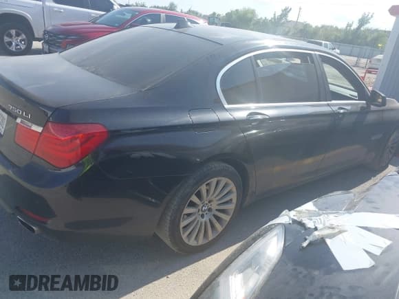 ✅ 2010 BMW 7 Series 750Li • VIN: WBAKB8C50ACY63936 • Lot: 42873844. Listed on IAAI with 149,573 mi. Free auction sales archive from the USA and detailed vehicle history report at DreamBid. Image 4.