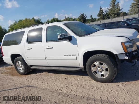 ✅ 2014 Chevrolet Suburban LT • VIN: 1GNSKJE7XER207987 • Lot: 43375552. Listed on IAAI with 146,389 mi. Free auction sales archive from the USA and detailed vehicle history report at DreamBid. Image 13.