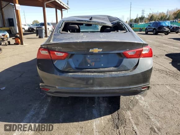2018 Chevrolet Malibu LS z VIN 1G1ZB5ST7JF234603, wystawiony jako Copart lot #91039485 z przebiegiem 65 830 mil mil oraz Czysty tytuł • Clean title. Historia ofert i sprzedaży dostępna na DreamBid. Obrazek 6.