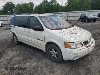 ✅ 1999 Pontiac Montana • VIN: 1GMDX03E3XD195661 • Lot: 62892514. Wystawiony na Copart z przebiegiem 225 516 mil. Bezpłatny archiwum sprzedaży aukcyjnych z USA i szczegółowy raport historii pojazdu na DreamBid. Zdjęcie 4.