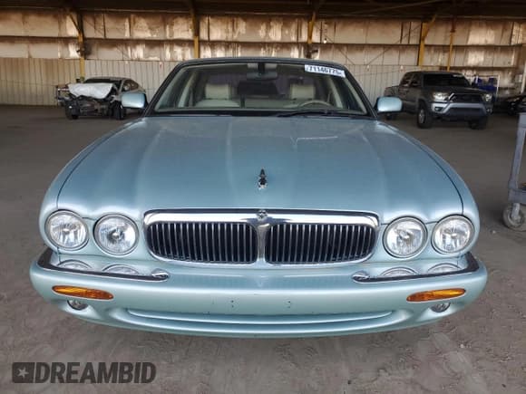 ✅ 2001 Jaguar XJ • VIN: SAJDA14C11LF31043 • Lot: 71146775. Wystawiony na Copart z przebiegiem 64 813 mil. Bezpłatny archiwum sprzedaży aukcyjnych z USA i szczegółowy raport historii pojazdu na DreamBid. Zdjęcie 5.