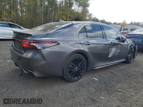 ✅ 2023 Toyota Camry Hybrid XSE • VIN: 4T1K31AK9PU614002 • Lot: 82035445. Wystawiony na Copart z przebiegiem 129 773 mil. Bezpłatny archiwum sprzedaży aukcyjnych z USA i szczegółowy raport historii pojazdu na DreamBid. Zdjęcie 3.