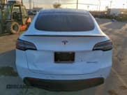 ✅ 2022 Tesla Model Y Performance • VIN: 7SAYGDEF9NF465682 • Lot: 96614035. Listed on Copart with 52,423 mi. Free auction sales archive from the USA and detailed vehicle history report at DreamBid. Image 6.