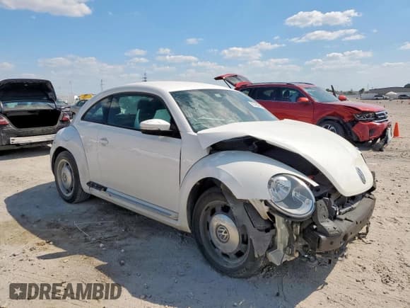 ✅ 2012 Volkswagen Beetle 2.5L • VIN: 3VWJX7AT0CM633050 • Lot: 81469485. Listed on Copart with 100,970 mi. Free auction sales archive from the USA and detailed vehicle history report at DreamBid. Image 4.