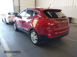 2010 Hyundai Tucson GLS with VIN KM8JUCAC5AU103469, listed as a IAAI auction lot 43394997 with 123,949 mi miles and . Bid and sale history available at DreamBid. Image 3.