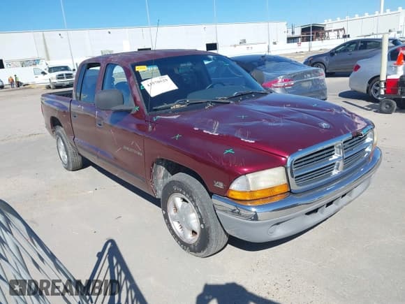 ✅ 2000 Dodge Dakota Sport • VIN: 1B7GL2AX8YS723964 • Lot: 43570529. Listed on IAAI with 136,989 mi. Free auction sales archive from the USA and detailed vehicle history report at DreamBid. Image 1.