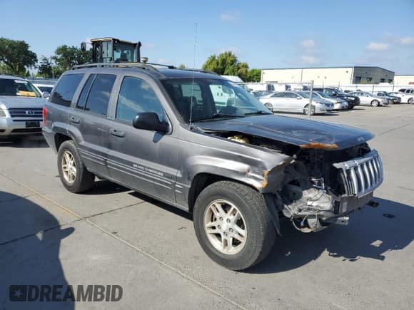 ✅ 2004 Jeep Grand Cherokee Laredo • VIN: 1J4GW48S04C269463 • Lot: 54611885. Listed on Copart with 155,675 mi. Free auction sales archive from the USA and detailed vehicle history report at DreamBid. Image 4.