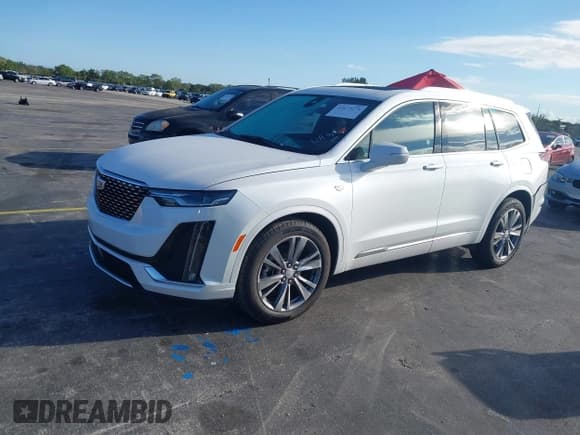 ✅ 2025 Cadillac XT6 FWD Premium Luxury • VIN: 1GYKPCRS9SZ122102 • Lot: 41677275. Listed on IAAI with 4,227 mi. Free auction sales archive from the USA and detailed vehicle history report at DreamBid. Image 2.