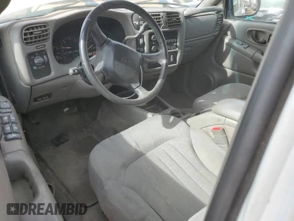 2004 Chevrolet Blazer LS z VIN 1GNDT13X74K161079, wystawiony jako Copart lot #76698914 z przebiegiem 123 726 mil mil oraz Szkoda całkowita • Salvage title. Historia ofert i sprzedaży dostępna na DreamBid. Obrazek 8.