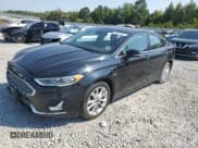 ✅ 2019 Ford Fusion Titanium • VIN: 3FA6P0SU7KR111160 • Lot: 80693325. Listed on Copart with 99,454 mi. Free auction sales archive from the USA and detailed vehicle history report at DreamBid. Image 1.
