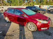 ✅ 2015 Ford Focus Titanium • VIN: 1FADP3J26FL215409 • Lot: 94588735. Wystawiony na Copart z przebiegiem 80 641 mil. Bezpłatny archiwum sprzedaży aukcyjnych z USA i szczegółowy raport historii pojazdu na DreamBid. Zdjęcie 4.