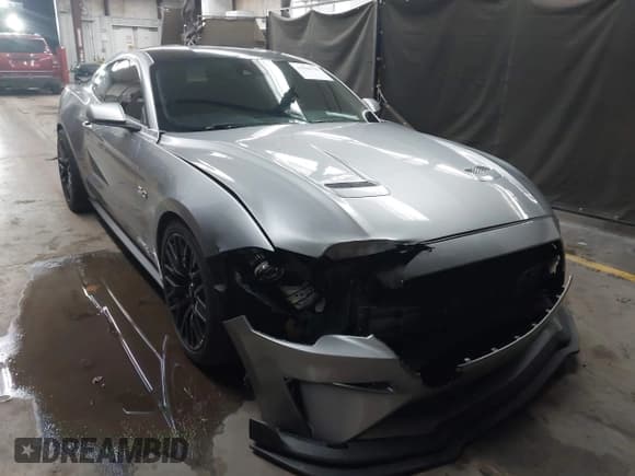 ✅ 2021 Ford Mustang GT • VIN: 1FA6P8CF8M5125265 • Lot: 43448790. Listed on IAAI with 93,670 mi. Free auction sales archive from the USA and detailed vehicle history report at DreamBid. Image 1.