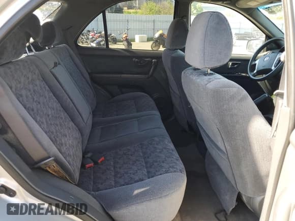 ✅ 2003 Kia Sorento LX • VIN: KNDJD733035175296 • Лот: 49673265. Опубликован ранее на Copart с пробегом 107 062 миль. Бесплатный доступ к архиву аукционных продаж из США и подробный отчёт об истории автомобиля на DreamBid. Изображение 12.