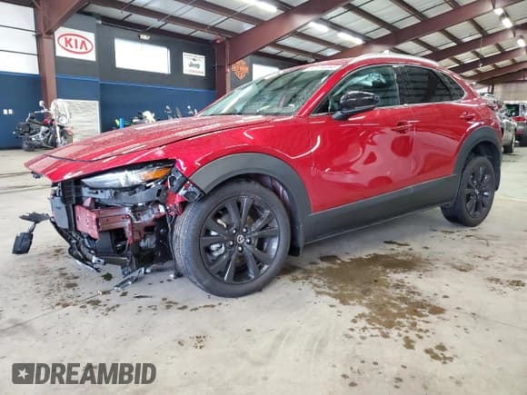 ✅ 2022 Mazda CX-30 Premium • VIN: 3MVDMBDY3NM428407 • Lot: 82110265. Wystawiony na Copart z przebiegiem 22 947 mil. Bezpłatny archiwum sprzedaży aukcyjnych z USA i szczegółowy raport historii pojazdu na DreamBid. Zdjęcie 1.