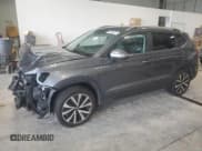 ✅ 2022 Volkswagen Taos SE • VIN: 3VVWX7B28NM050342 • Lot: 66549475. Listed on Copart with 24,835 mi. Free auction sales archive from the USA and detailed vehicle history report at DreamBid. Image 1.