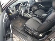 ✅ 2014 Hyundai Veloster • VIN: KMHTC6AD4EU184184 • Lot: 75909334. Wystawiony na Copart z przebiegiem 124 962 mil. Bezpłatny archiwum sprzedaży aukcyjnych z USA i szczegółowy raport historii pojazdu na DreamBid. Zdjęcie 8.