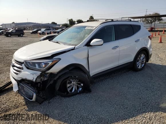 ✅ 2018 Hyundai Santa Fe 2.0T • VIN: 5XYZU4LA0JG554836 • Лот: 65013984. Опубликован ранее на Copart с пробегом 102 398 миль. Бесплатный доступ к архиву аукционных продаж из США и подробный отчёт об истории автомобиля на DreamBid. Изображение 1.