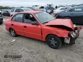 2001 Hyundai Accent GL z VIN KMHCG45C81U219104, wystawiony jako Copart lot #51597985 z przebiegiem 157 597 mil mil oraz Szkoda całkowita • Salvage title. Historia ofert i sprzedaży dostępna na DreamBid. Obrazek 4.