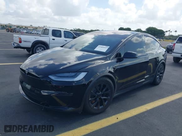 ✅ 2022 Tesla Model X • VIN: 7SAXCDE56NF339696 • Lot: 42481643. Wystawiony na IAAI z przebiegiem 25 934 mil. Bezpłatny archiwum sprzedaży aukcyjnych z USA i szczegółowy raport historii pojazdu na DreamBid. Zdjęcie 2.