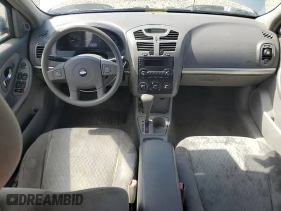 2004 Chevrolet Malibu z VIN 1G1ZS52F74F242814, wystawiony jako Copart lot #66764714 z przebiegiem 228 578 mil mil oraz Czysty tytuł • Clean title. Historia ofert i sprzedaży dostępna na DreamBid. Obrazek 8.