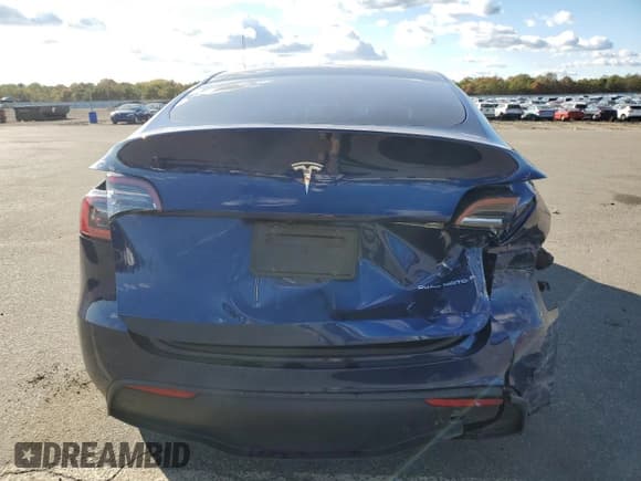 ✅ 2023 Tesla Model Y Long Range • VIN: 7SAYGDEEXPA211843 • Лот: 82739925. Опубликован ранее на Copart с пробегом 34 335 миль. Бесплатный доступ к архиву аукционных продаж из США и подробный отчёт об истории автомобиля на DreamBid. Изображение 6.