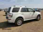 2010 Mercury Mariner Premier с VIN 4M2CN9H72AKJ24775, выставлен на аукционе Copart как лот 65381985 с пробегом 162 621 миль миль и Списание • Salvage title. История ставок и продаж доступна на DreamBid. Изображение 3.