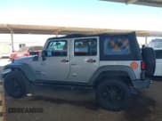 ✅ 2016 Jeep Wrangler Unlimited Sport • VIN: 1C4BJWDGXGL129081 • Lot: 43567358. Listed on IAAI with 120,099 mi. Free auction sales archive from the USA and detailed vehicle history report at DreamBid. Image 14.