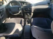 ✅ 1996 Ford Contour • VIN: 1FALP65L5TK212857 • Лот: 76701614. Опубликован ранее на Copart с пробегом 74 994 миль. Бесплатный доступ к архиву аукционных продаж из США и подробный отчёт об истории автомобиля на DreamBid. Изображение 8.