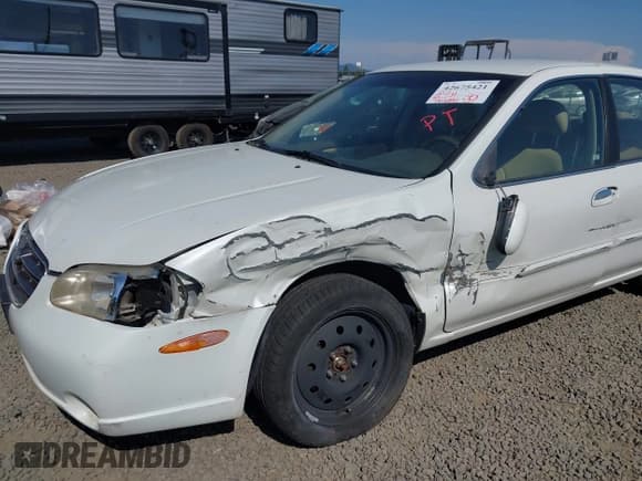 ✅ 2000 Nissan Maxima GXE • VIN: JN1CA31D7YT700656 • Lot: 42675421. Wystawiony na IAAI z przebiegiem 94 006 mil. Bezpłatny archiwum sprzedaży aukcyjnych z USA i szczegółowy raport historii pojazdu na DreamBid. Zdjęcie 6.