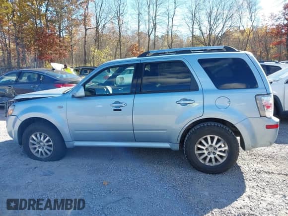 2009 Mercury Mariner Premier with VIN 4M2CU97739KJ14224, listed as a IAAI auction lot 43552437 with 103,277 mi miles and . Bid and sale history available at DreamBid. Image 14.