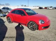 ✅ 2013 Volkswagen Beetle Turbo • VIN: 3VWV67AT8DM608578 • Лот: 41790485. Опубликован ранее на Copart с пробегом 79 258 миль. Бесплатный доступ к архиву аукционных продаж из США и подробный отчёт об истории автомобиля на DreamBid. Изображение 4.