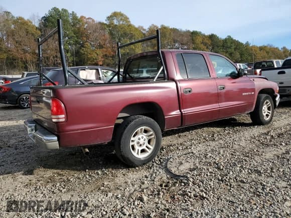 ✅ 2001 Dodge Dakota Sport • VIN: 1B7HL2AX21S313896 • Lot: 82873164. Wystawiony na Copart z przebiegiem 205 821 mil. Bezpłatny archiwum sprzedaży aukcyjnych z USA i szczegółowy raport historii pojazdu na DreamBid. Zdjęcie 3.